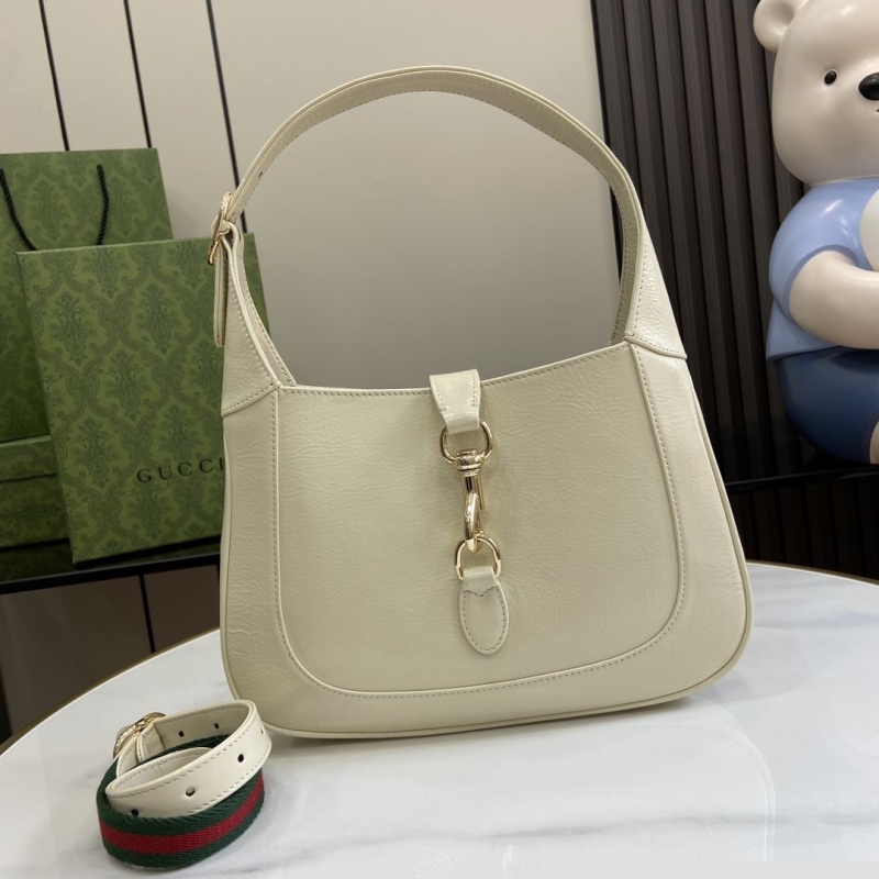 G*u*i top handle bags